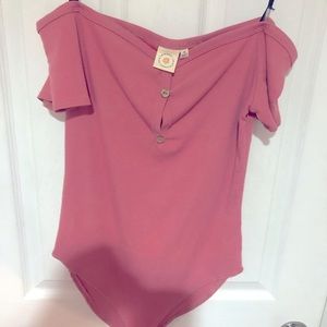 Pink body suit